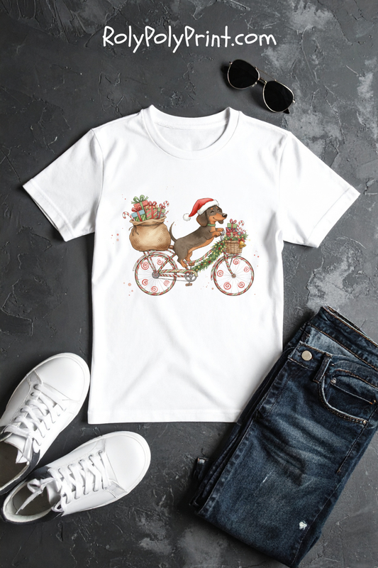 Dachshund Christmas Bike - Christmas T‑Shirt | Holiday | Roly Poly Print